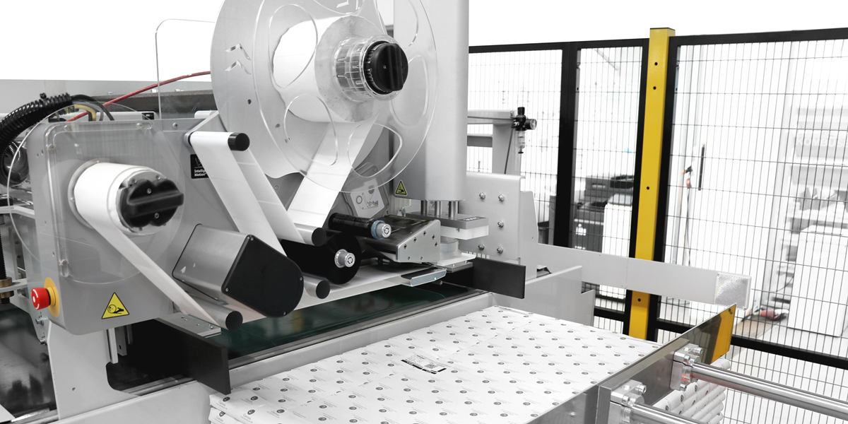 Wrapmatic GRSX Ream Wrapper Palletizer with Labeler