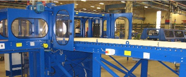 TIP_130-0418_Storage Bed & Roller Conveyor with One Piece Storage Bed & Discharge Pusher