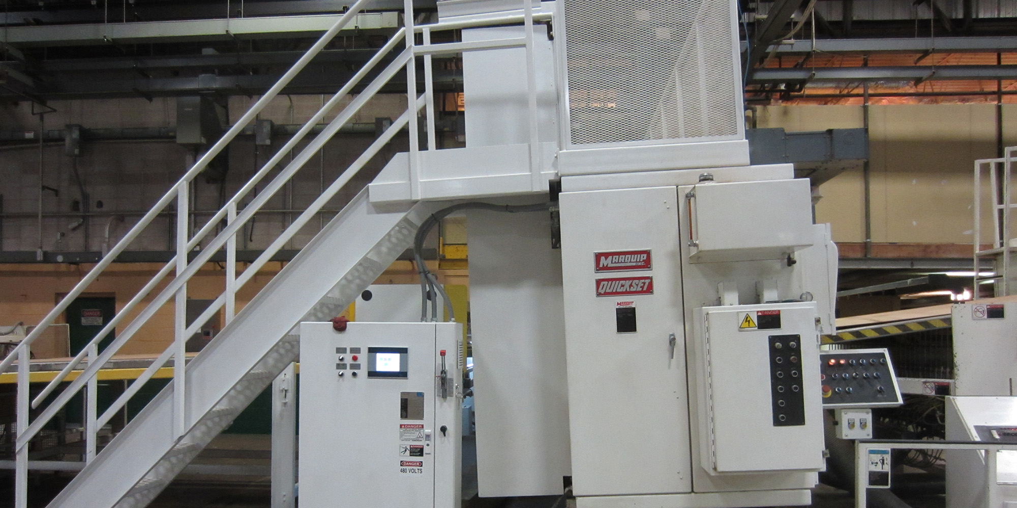gebrauchte-zertifizierte-schnellschneidemaschine-mit-rasiermesserschneidemaschine Wellpappenschneidemaschine MarquipWardUnited